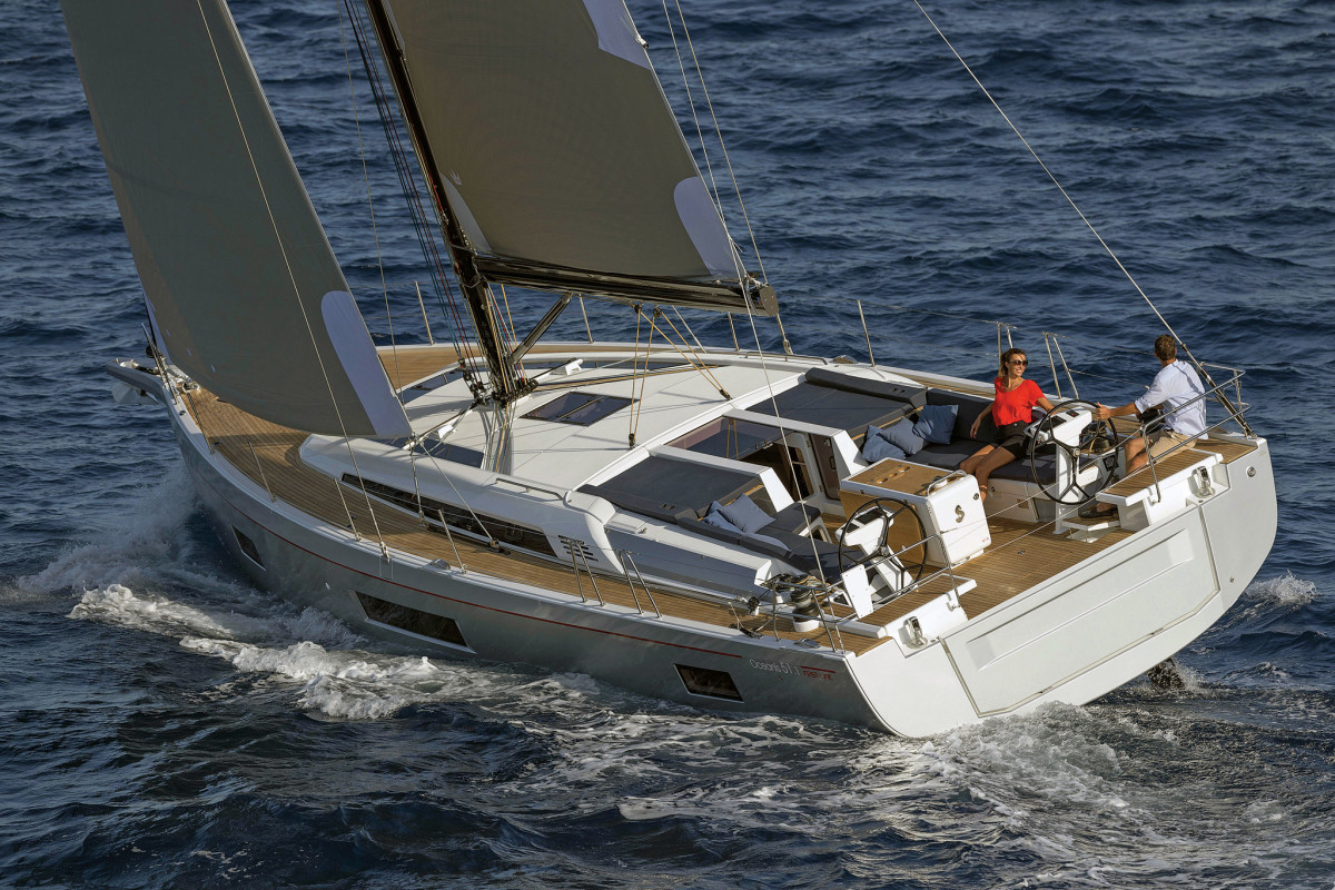 Lelis Sailing - Oceanis 51.1 external view with a person navigating the boat